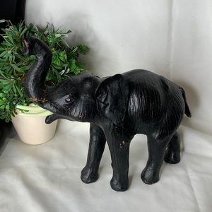 Large vintage black leather elephant figure.